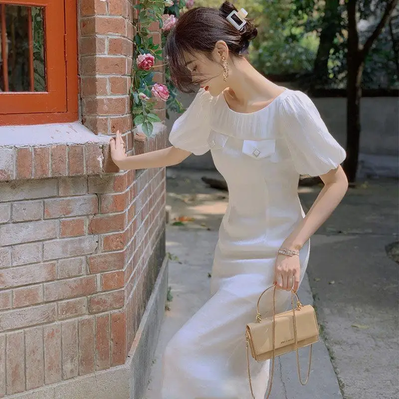 

2023 New Summer Women Dress White Crew Neck Bubble Sleeves Casual Sweet French Retro Fairy Wind Long Dress Minimalist Commuting
