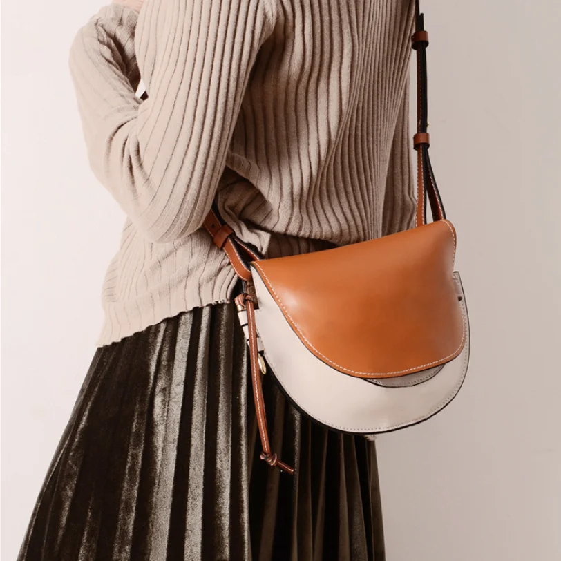 

Trendy women's bags Europe and the United States big-name mini leather retro fashion high-end messenger bag bow saddle bag