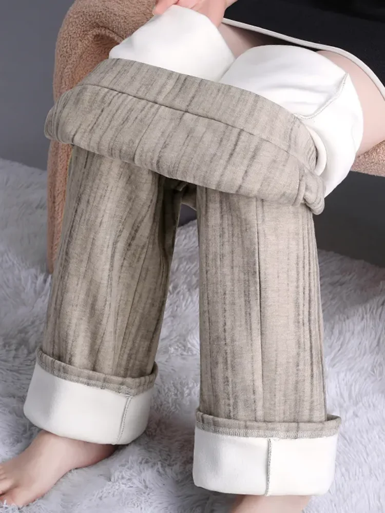 Зимние теплые свободные широкие брюки женские эластичные с высокой талией и