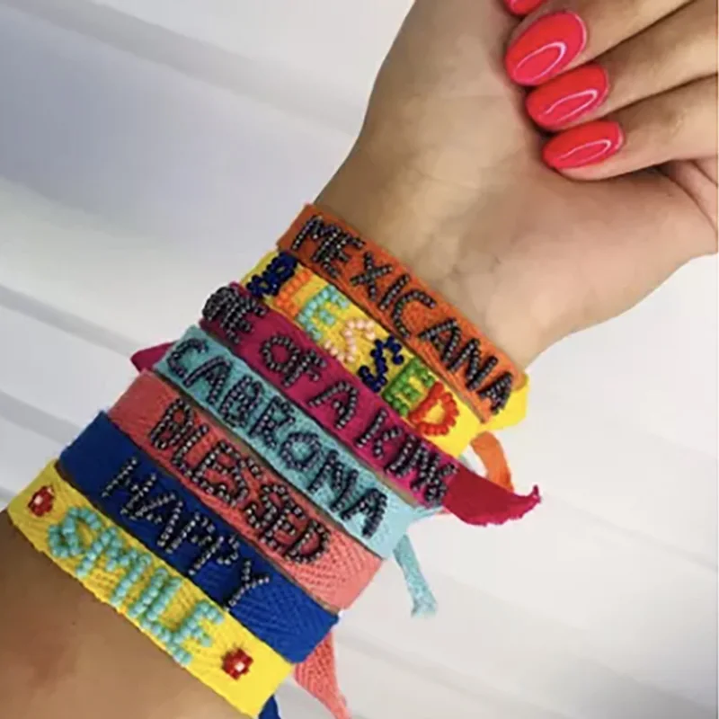 

Браслет женский плетеный в богемном стиле с буквами и бусинами