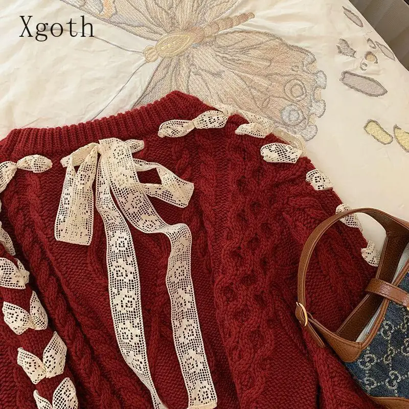 Женский трикотажный пуловер в стиле оверсайз с бантом