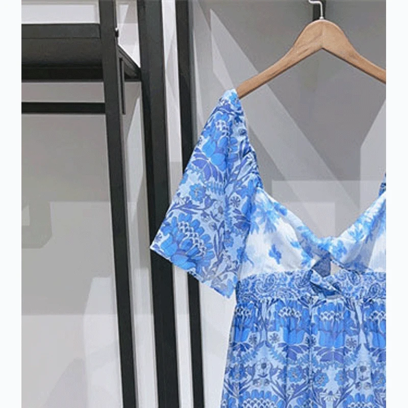 

2023 Women Summer New V-neck Printed Splicing Twist Knot Backless Ruffle Dress