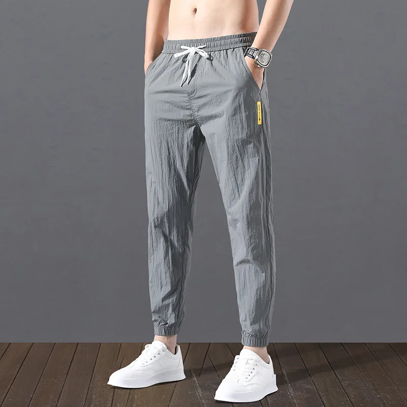 

Men's Pants Casual Ninth Pants Men's Trend Versatile Loose Sports Pants Ice Silk Summer Thin Section Men's Korean Version