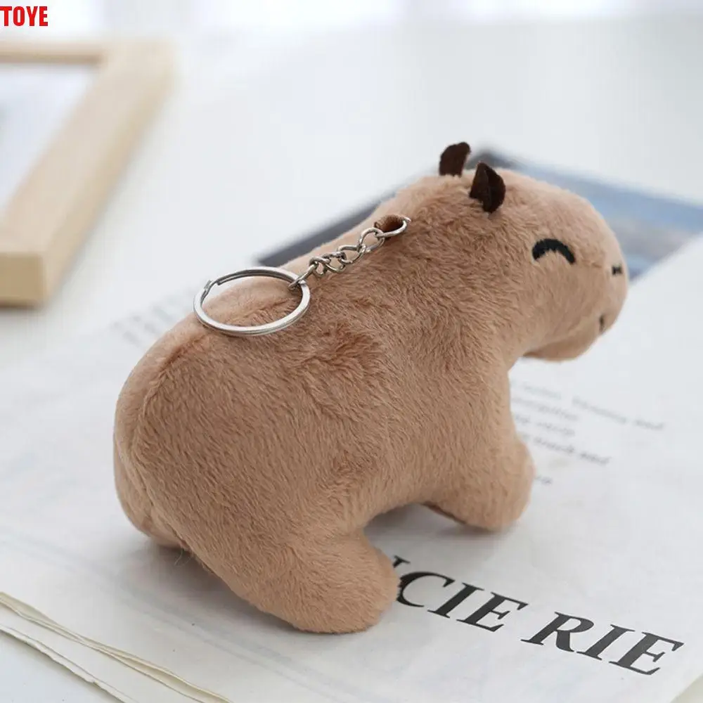 Плюшевый брелок Reallilfe Capybara коричневый с мультяшными мягкими животными хаки 12 см