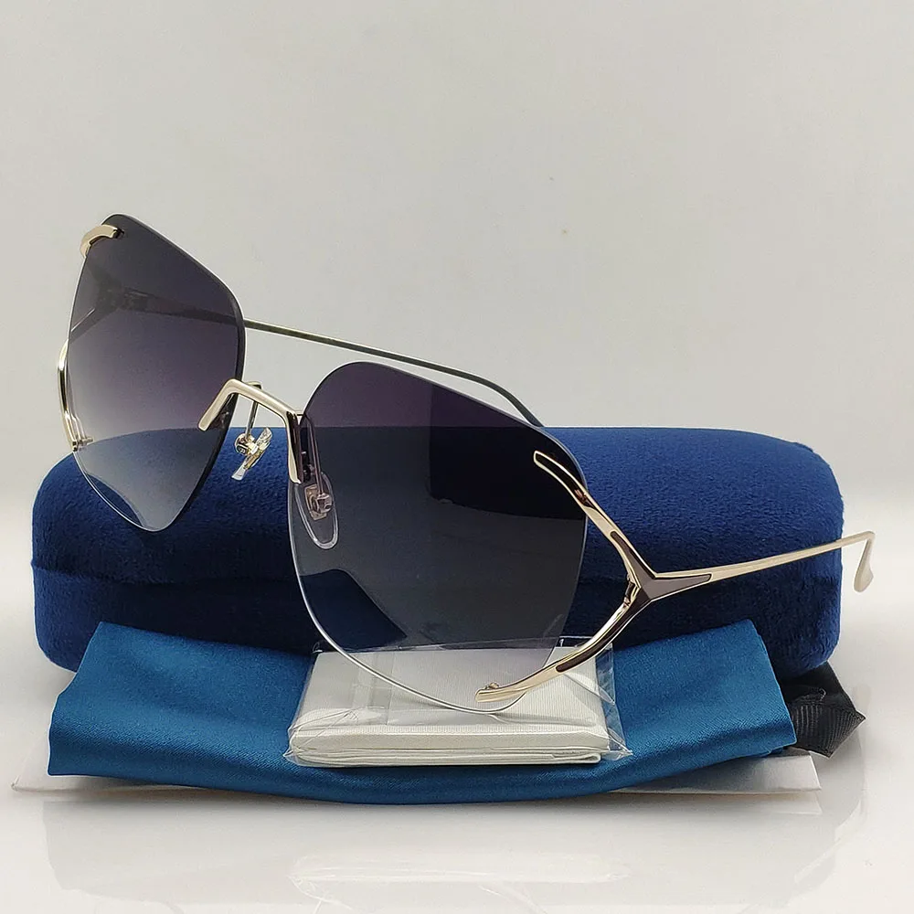 

Hot 2023 New Rimless Sunglasses For Women Male Aesthetic Party Brand Designer New Irregular Fashion Cool Rimless Sun Glasses