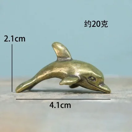 

Медная статуэтка дельфина