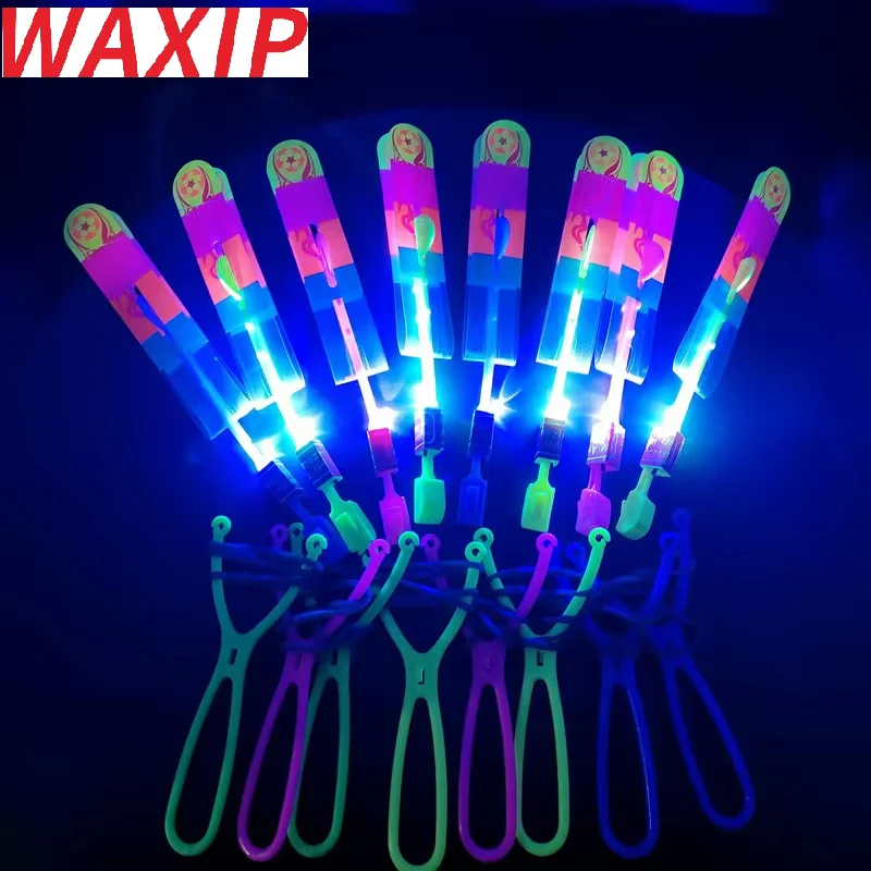 

100Pcs/lot or 50pcs Amazing Light Toy Arrow Rocket Helicopter Flying Toy LED Light Toys Party Fun Gift Rubber Band Catapult