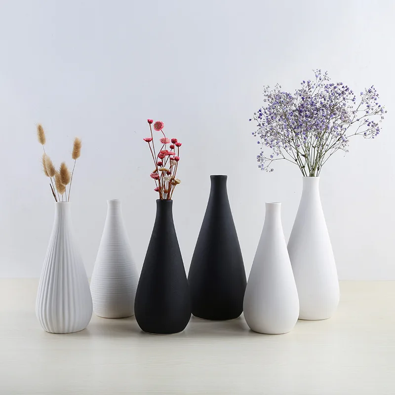 

Simple and modern ceramic vase Nordic white vase Chinese crafts home decoration