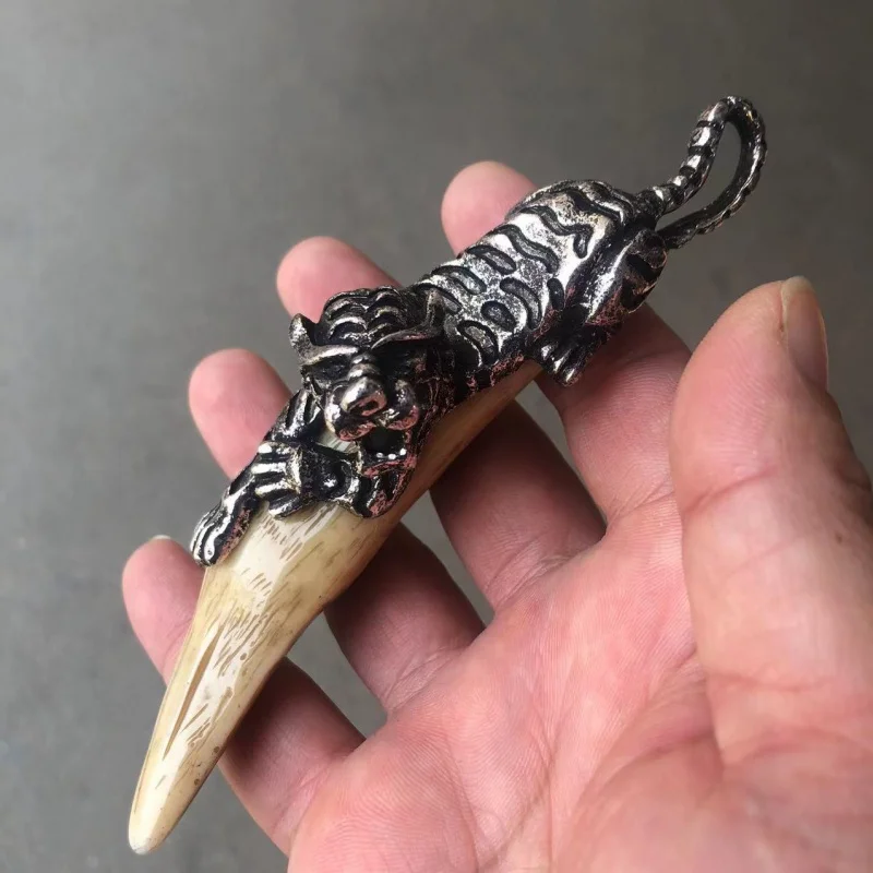 

Antique Collection Wholesale Inlaid Tibetan Silver Tiger Head Retro Wild Pig Tooth Pendant Ornaments Hand Pieces Pendant