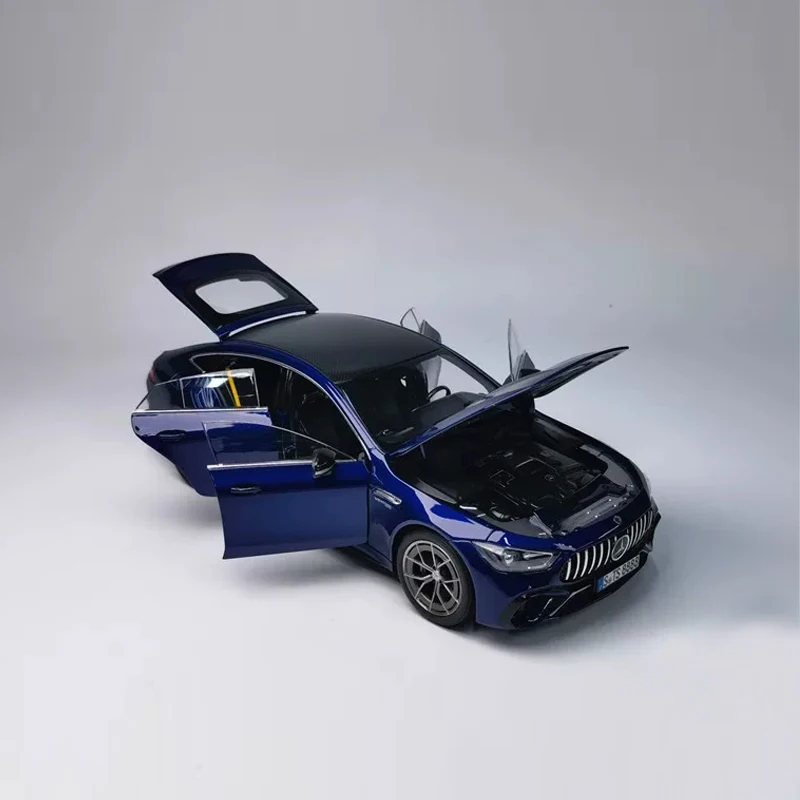 Фото Металлическая миниатюрная модель автомобиля Norev 1:18 Mercedes-Benz AMG GT63 4MATIC синего цвета с открывающимися дверями, литая под давлением, игрушка №2