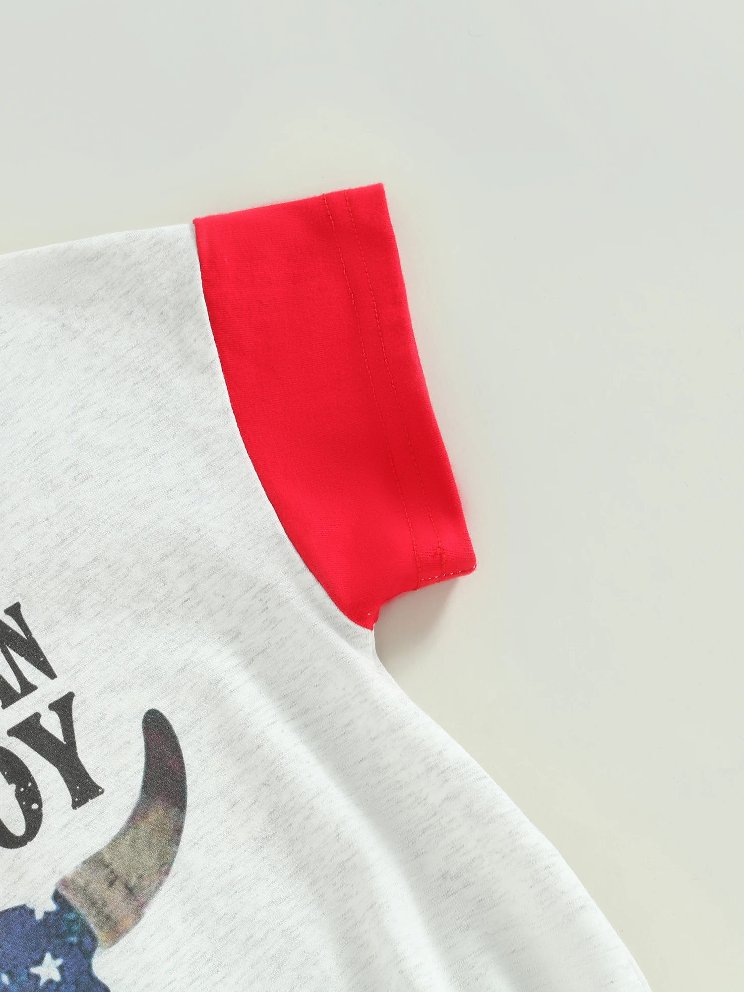 

Комбинезон без рукавов с цветочным принтом и бантом