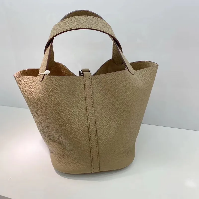 

New 2023 Head Layer Cowhide Fashion Omnibus Basket Bag Portable Bucket Bag Leather Hand Carrying Women's Bag