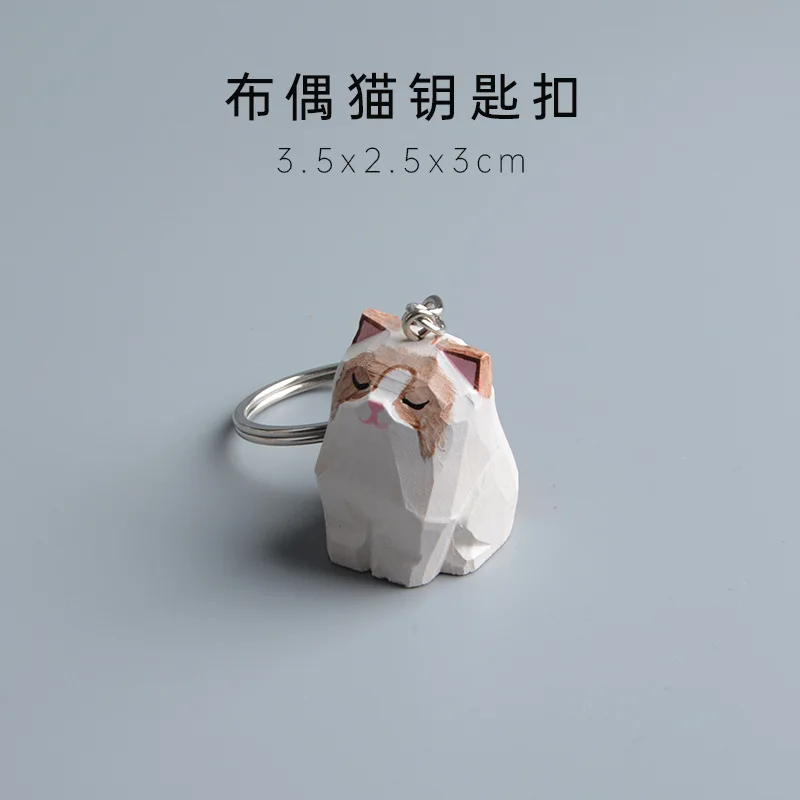 

Деревянные миниатюры сиамских кошек