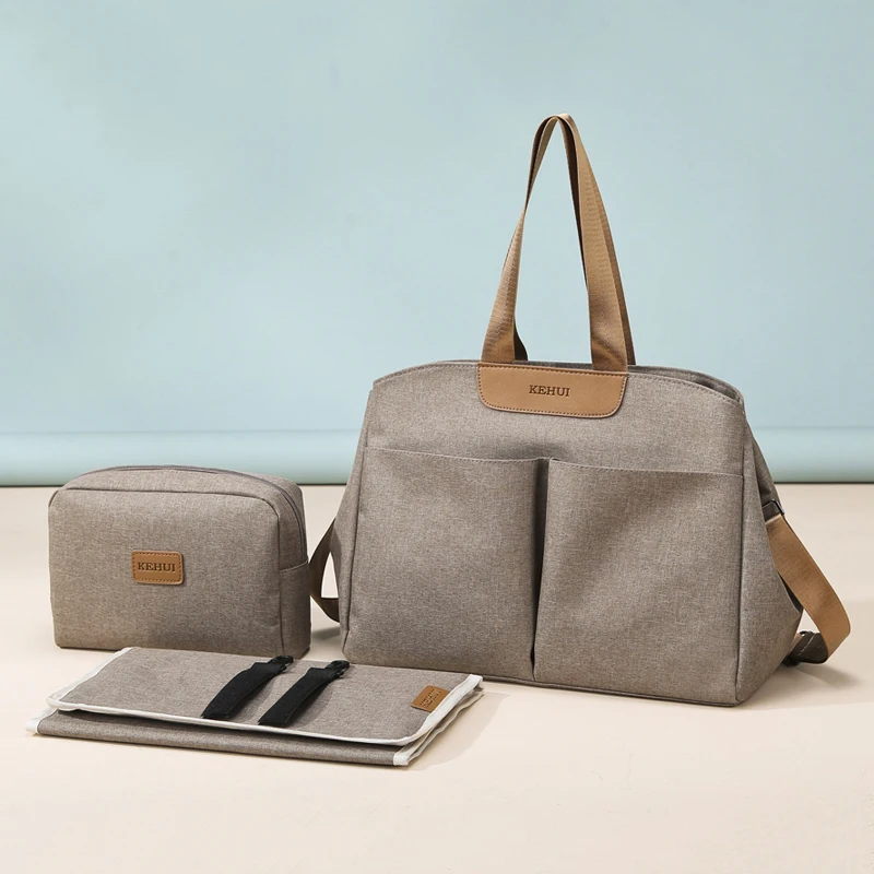 Przenośna wielofunkcyjna torba na pieluchy z zamkiem błyskawicznym i dużą pojemnością dla niemowląt marki Upnzt