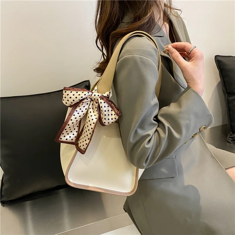 

2022 New Women's Fashion High-Capacity Shoulder Bag Retro Solid Color PU Leather Ribbon Decoration Underarm Casual Women Bags