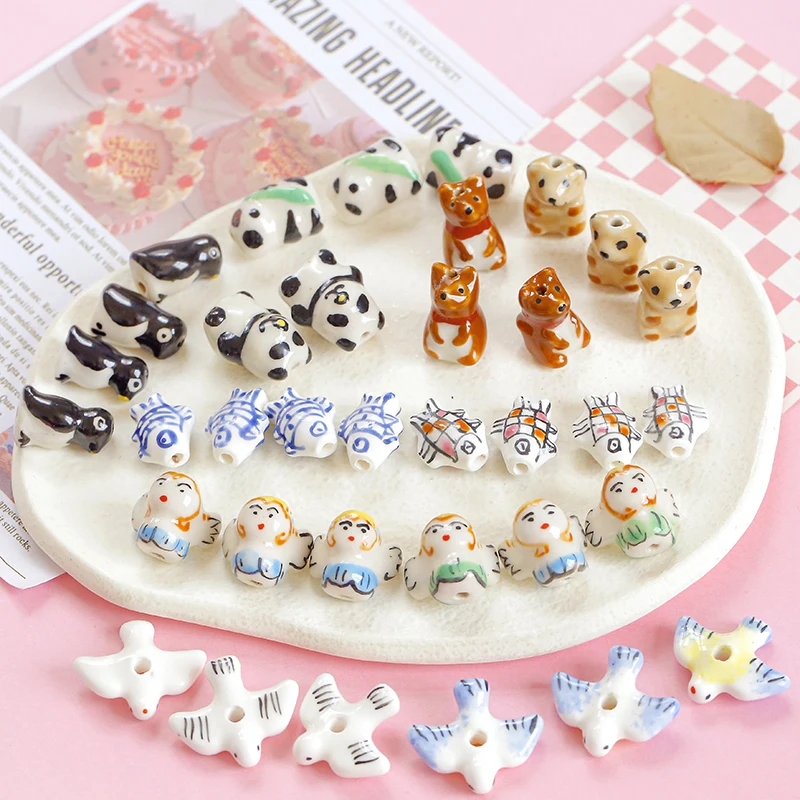 

Cute and Fun Childlike Heart Handdrawn Ceramic Pigeon Angel Panda Fish Animal Beads DIY Handmade Beading Materials