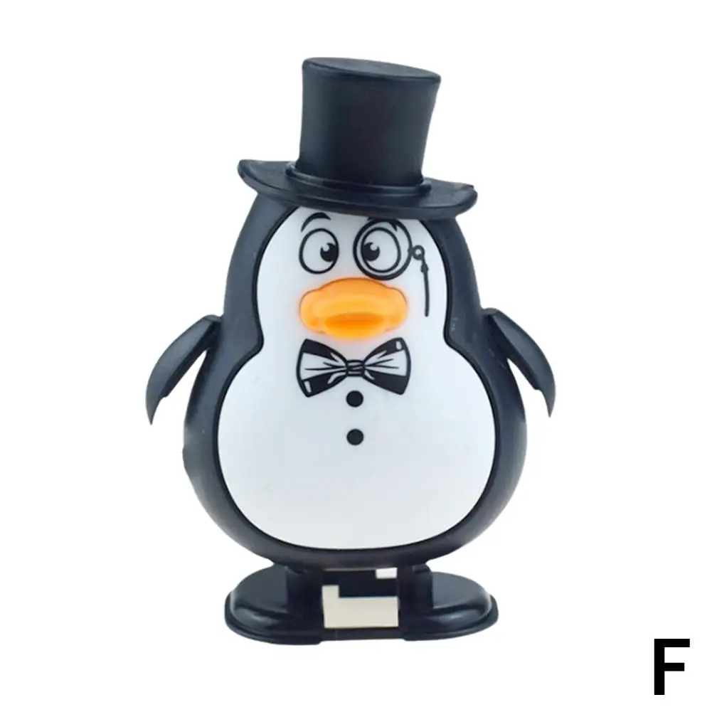 Заводные рождественские игрушки: Санта Клаус, олень, пингвин, снеговик