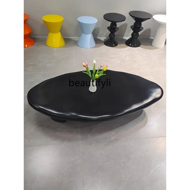 Кофейный столик в нордическом кремовом стиле из камня овальной формы