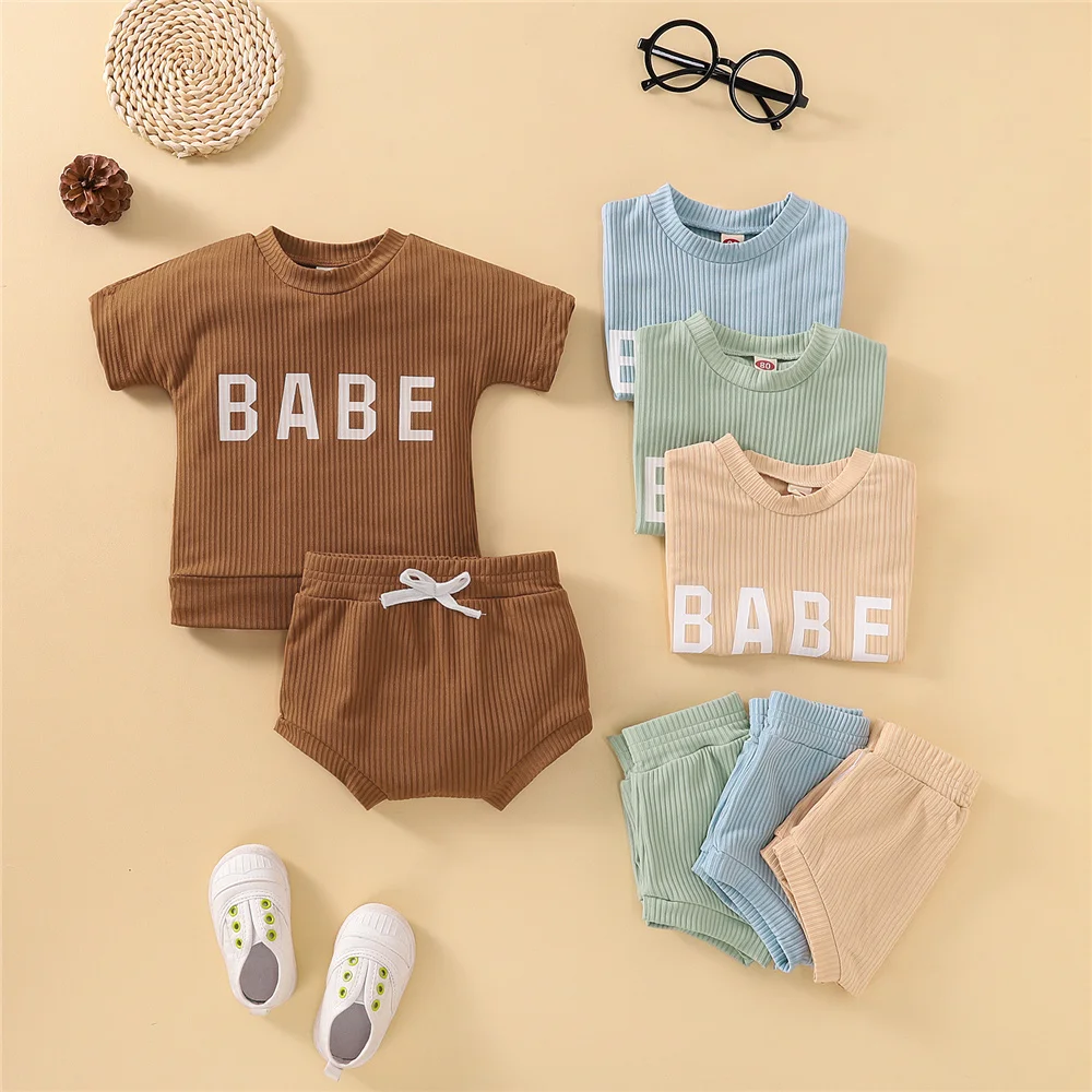 

2022 Summer Unisex Baby Solid Color 2 Piece Sets Toddler Infant Boy Girl Short Sleeve Letter Printed Tops Shorts Cotton Clothes