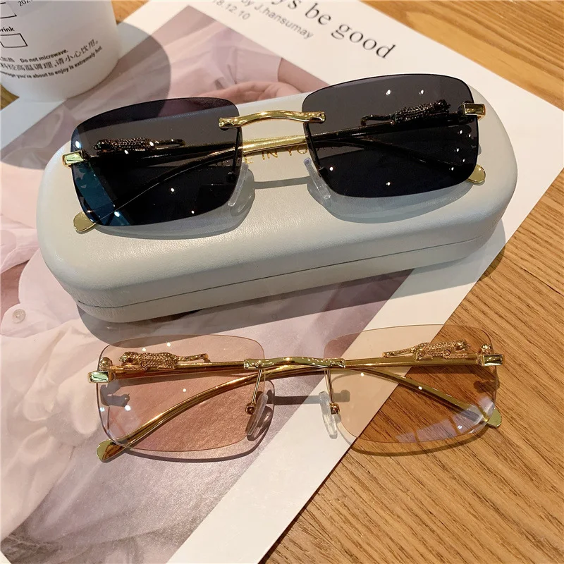 

2023 new rimless rectangular retro metal leopard head sunglasses fashionable frameless tinted glasses sunglasses women men
