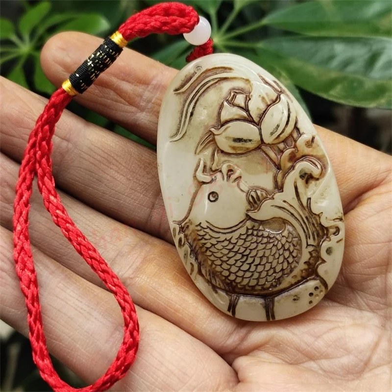 

The white jade pendant has more than fish every year, Carp Playing Lotus Pendant, exquisite Women's and men's jade pendant