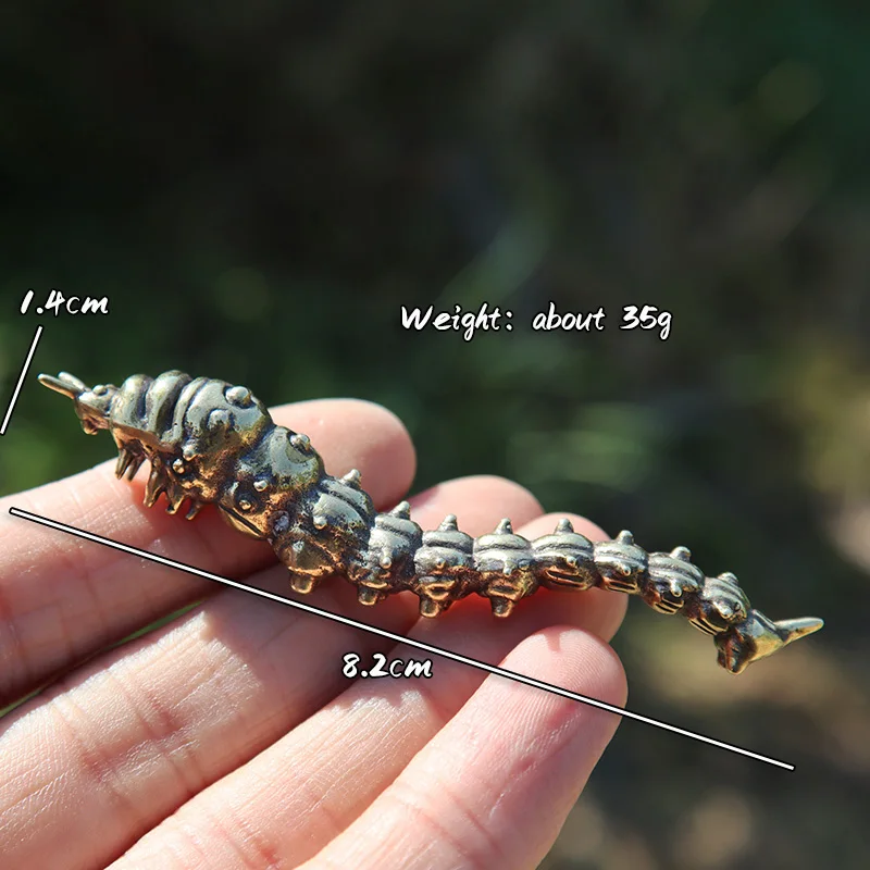 

Латунные фигурки гусениц