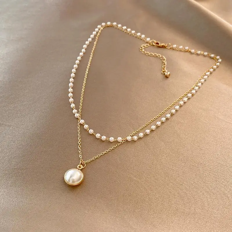 Купи Europe and the United States fashion double layer wear pearl necklace 2022 new fashion temperament net red clavicle chain female за 156 рублей в магазине AliExpress