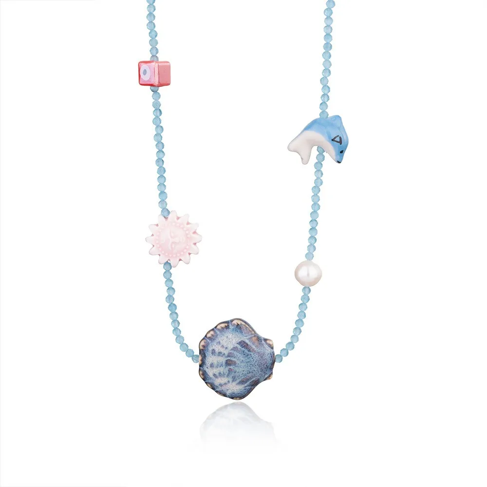 Богемское ожерелье из кристаллов и ракушек