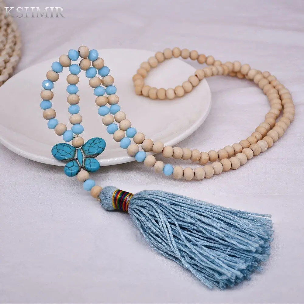 

New Bohemian leisure free wind hand string wooden beads, turquoise butterfly pendant, tassel, long necklace for women
