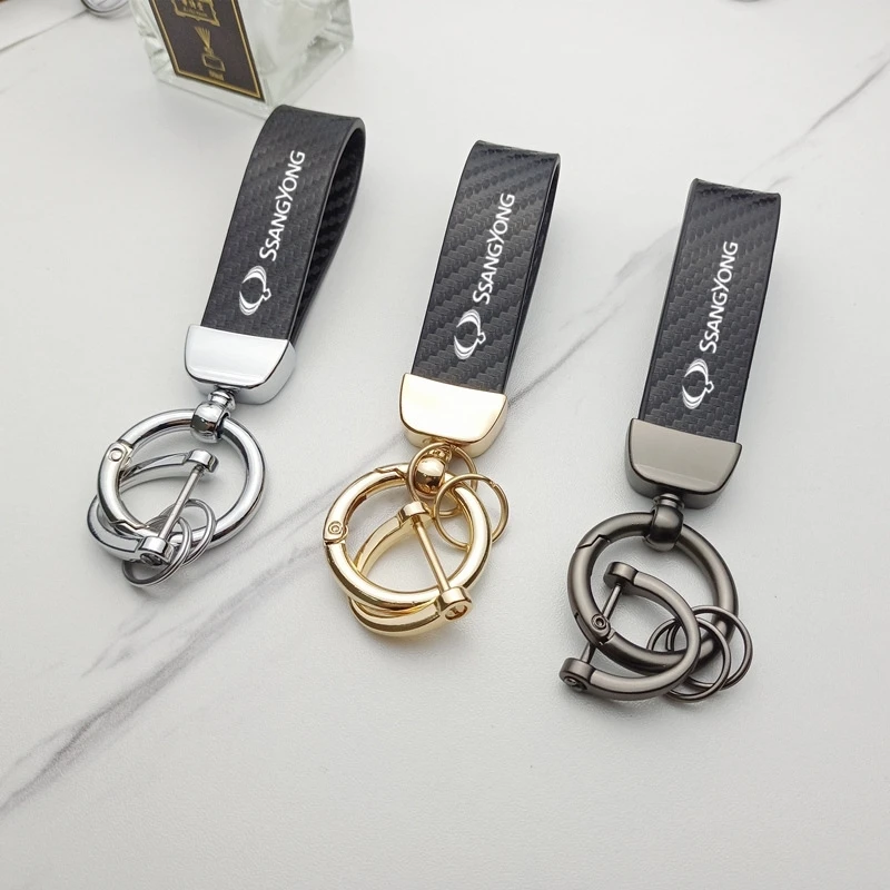 

For SsangYong Actyon Kyron Korando Stavic Rexton Sports Musso Rodius XIV-2 Car styling Carbon fiber Leather Custom Car KeyChain