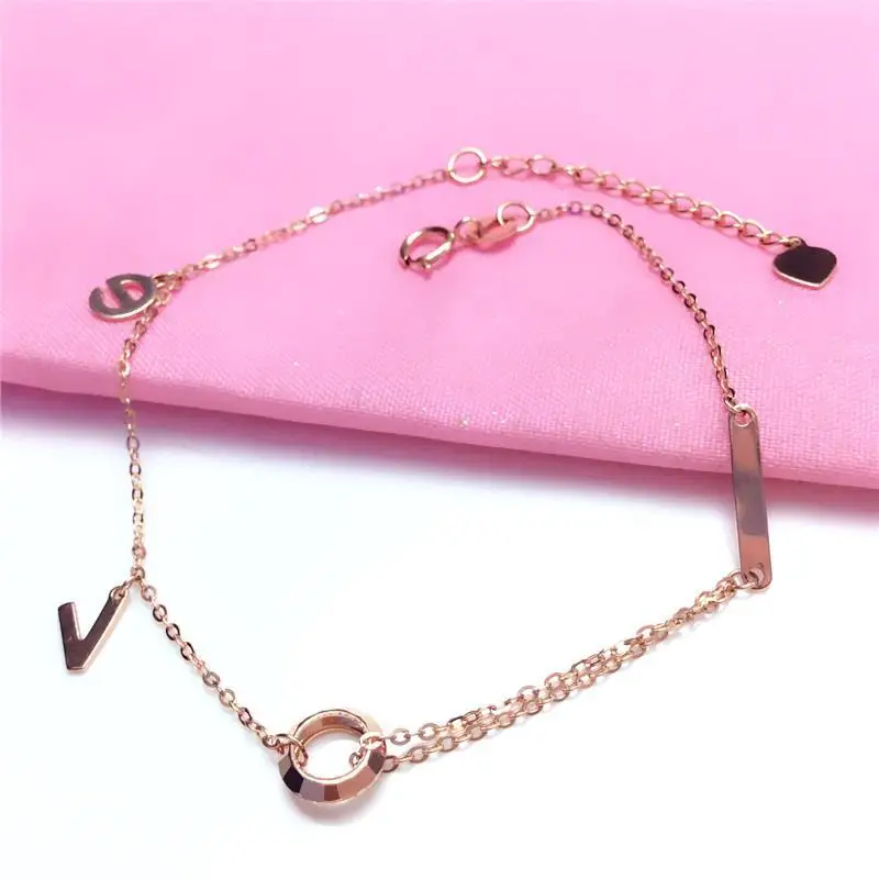 

Женский браслет из розового золота 585 пробы с надписью «love»