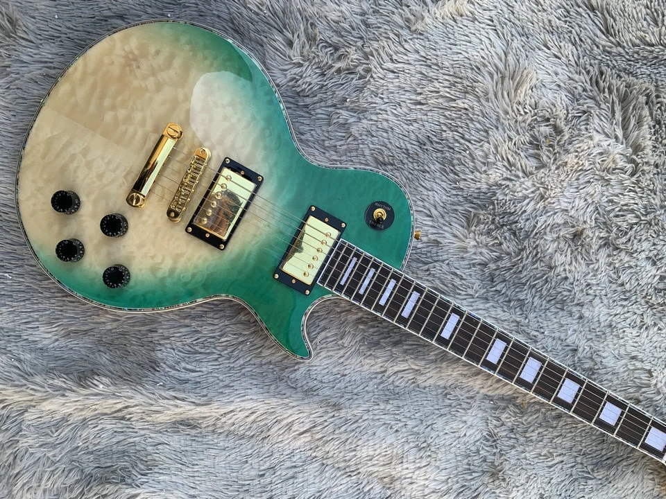 

In stock green and natural color LP electric guitar, mahogany body with quilted maple top we can customize the guitar