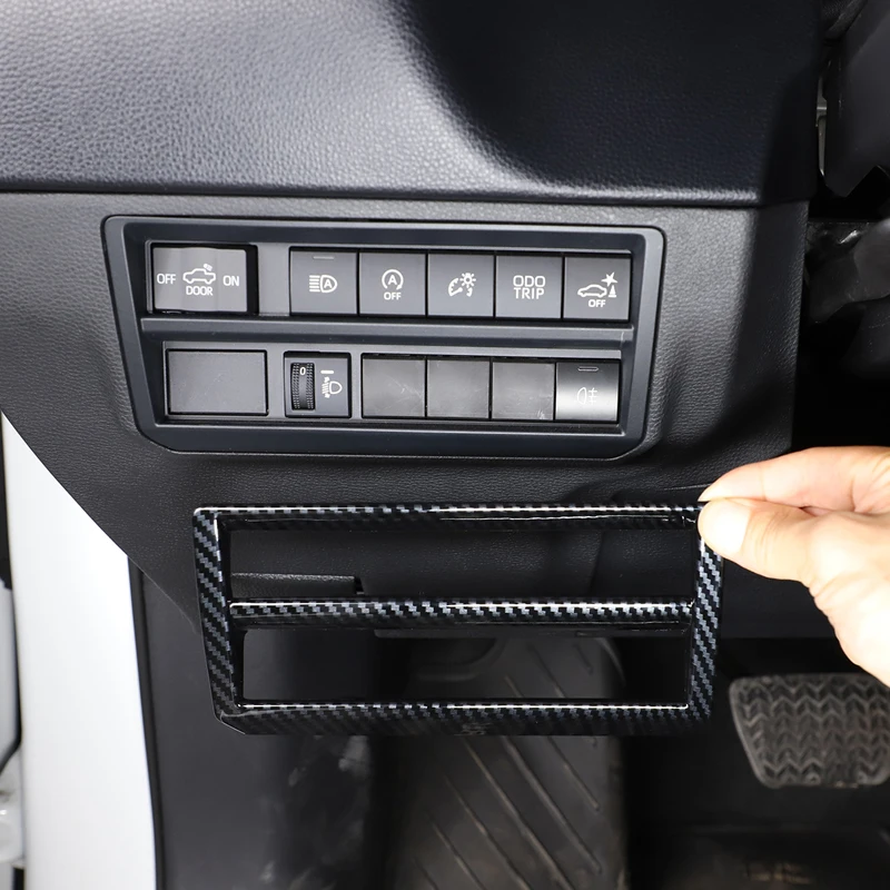 

For 22-23 Toyota Tundra headlight adjustment switch decorative frame interior styling decorative parts ABS carbon fiber pattern