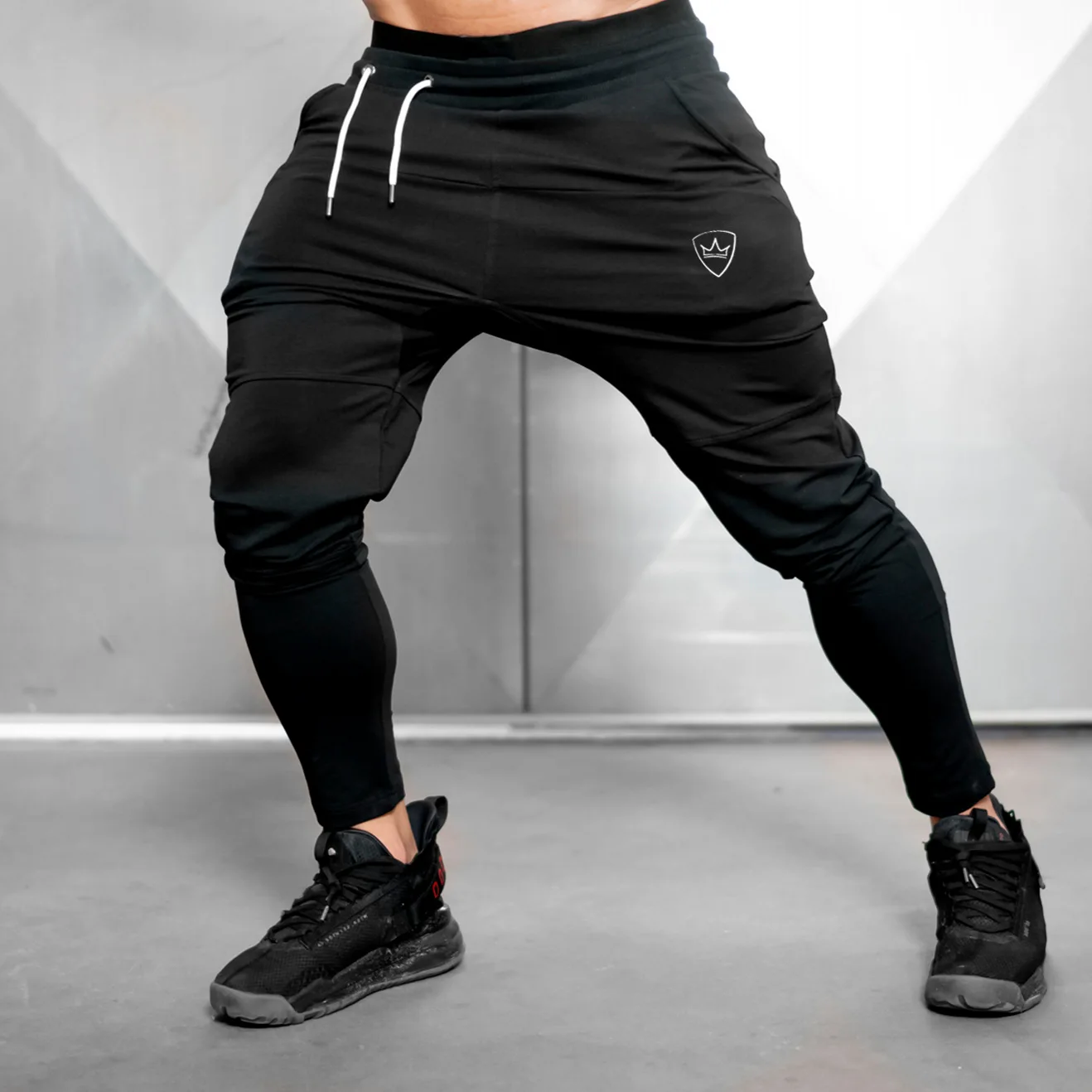 

Muscle Fitness Brother Sports Men's New Pants Running Sports Pants Slim Small Feet Spring and Autumn Fashion Casual Pants