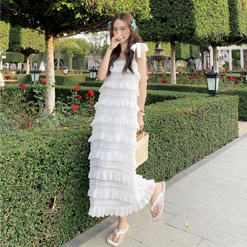 

Экзотическая многослойная юбка в стиле ins, Новинка лета 2022, белое темпераментное платье на бретелях с бантом для женщин