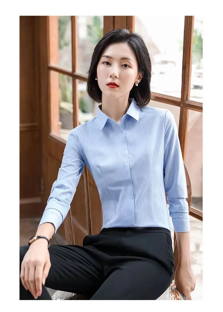 

Blue and white striped shirt, female professional slim fitting work attire, beauty salon, jewelry store, formal attire, hotel fr