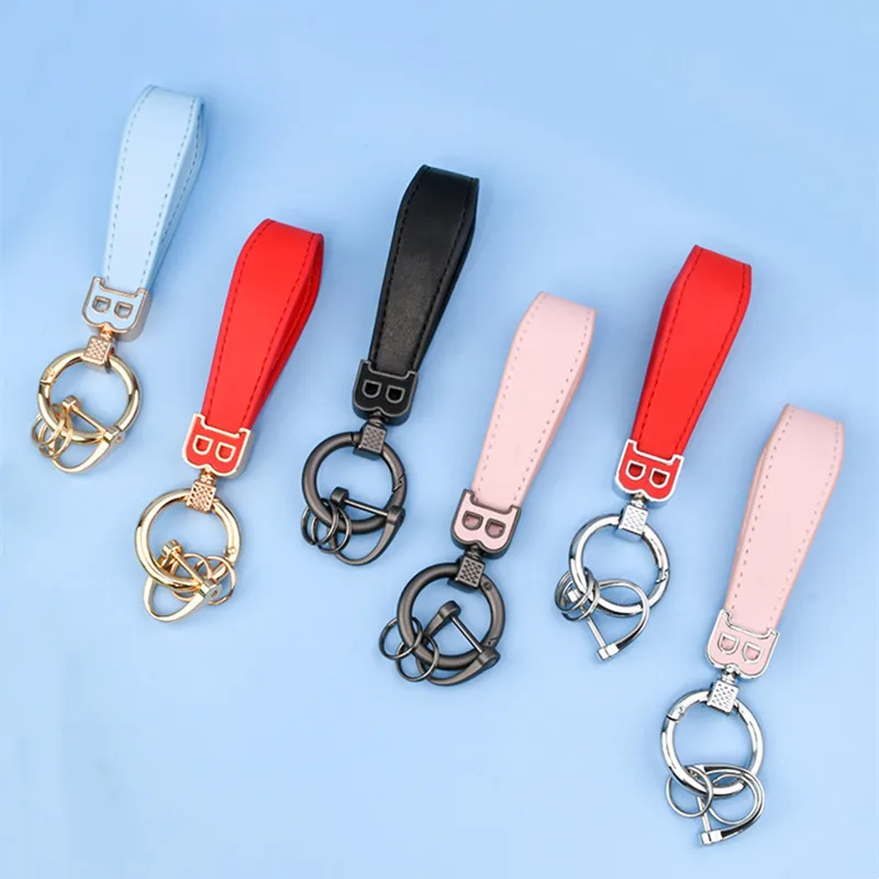 

Высококачественный мужской замшевый брелок, универсальный бытовой Кожаный Автомобильный брелок, подвесные аксессуары, черный металлическ...