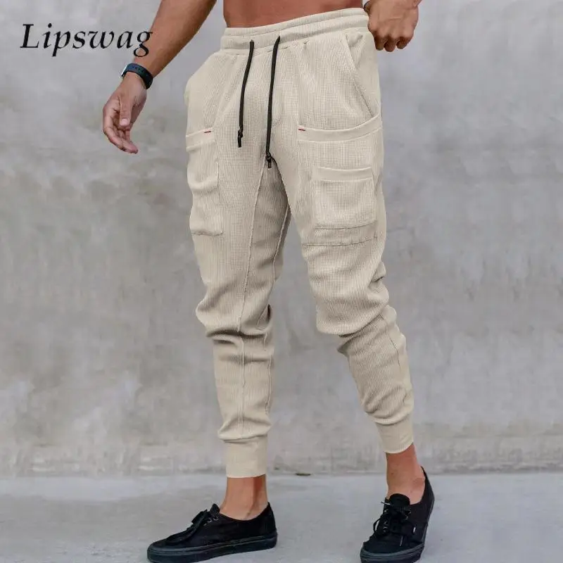 Брюки мужские эластичные приталенные повседневные модные однотонные штаны для