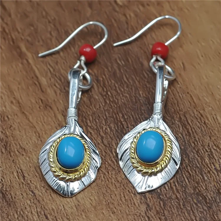 

Original reproduction 925 Sterling Silver Inlaid Turquoise Phnom Penh Feather Earrings