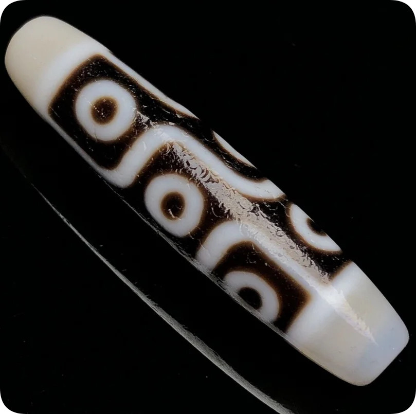 Черно-белый материал белое сердце сложенная линия девять глаз агат Tianzhu Lezi