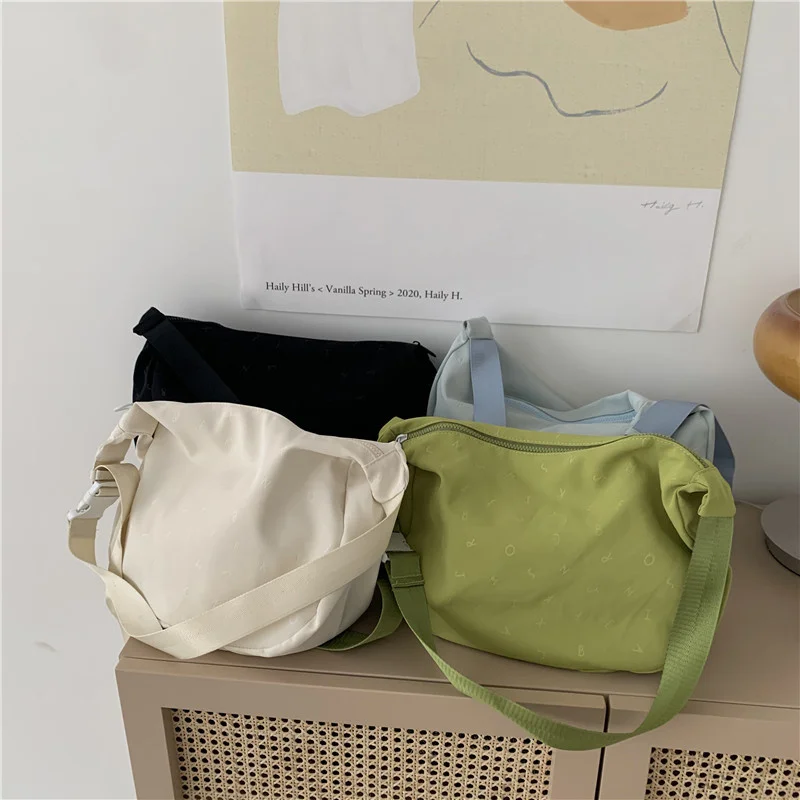 

New versatile simple messenger bag printed unique single shoulder bag female couple bag large capacity nylon dumpling bag