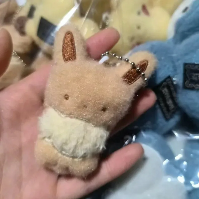 Фото Новый брелок Eevee Snorlax Ditto, милый мультяшный аксессуар для школьного рюкзака, портативный брелок-антипотеряшка, подарок на Хэллоуин №4