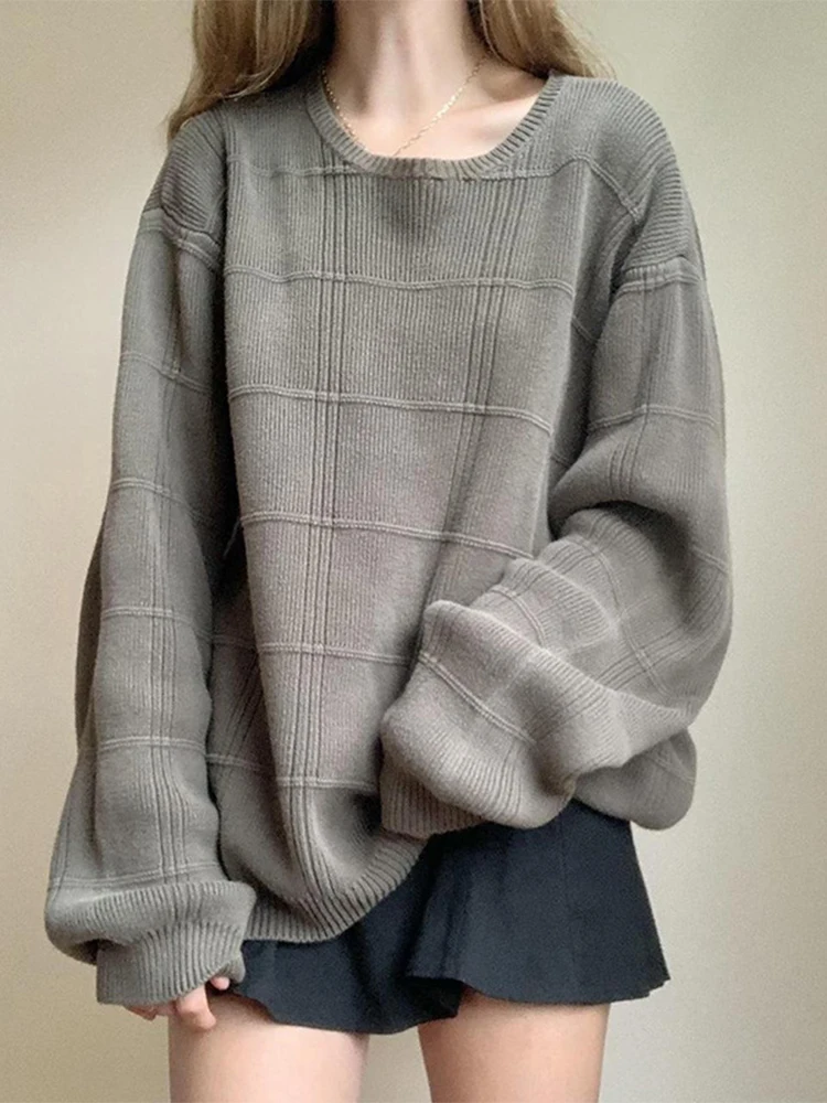 

Женский вязаный свитер в крупную клетку, с круглым вырезом