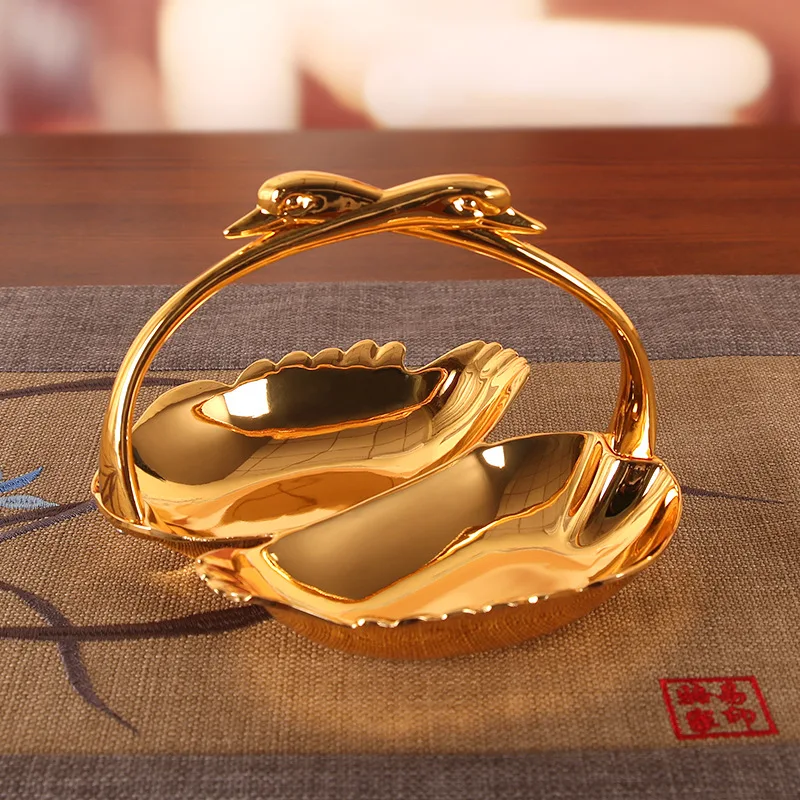 

Swan fruit plate, two pits of double creative green snake high-end small candy plate metal mesh red two kinds of divided plates.