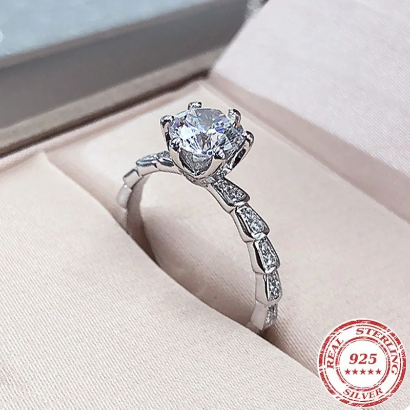 

Silver Color Rings for Women Trend 1ct Round Zirconia Diamond Snake Shape Ring Wedding Band Engagement Bridal Jewelry