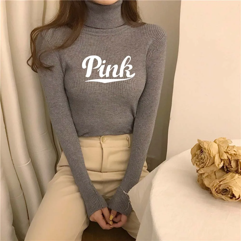 Женский вязаный пуловер с высоким воротом