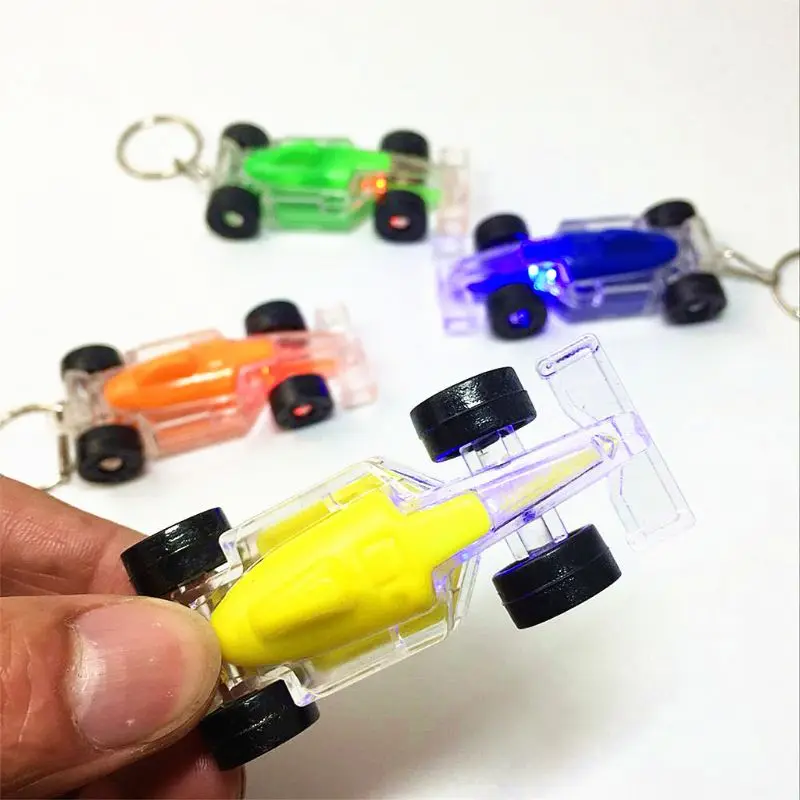 

Mini Racing LED Light-Up Toys Keychain Party Favors Kids Toy Gift Gadgets Bag Pendant