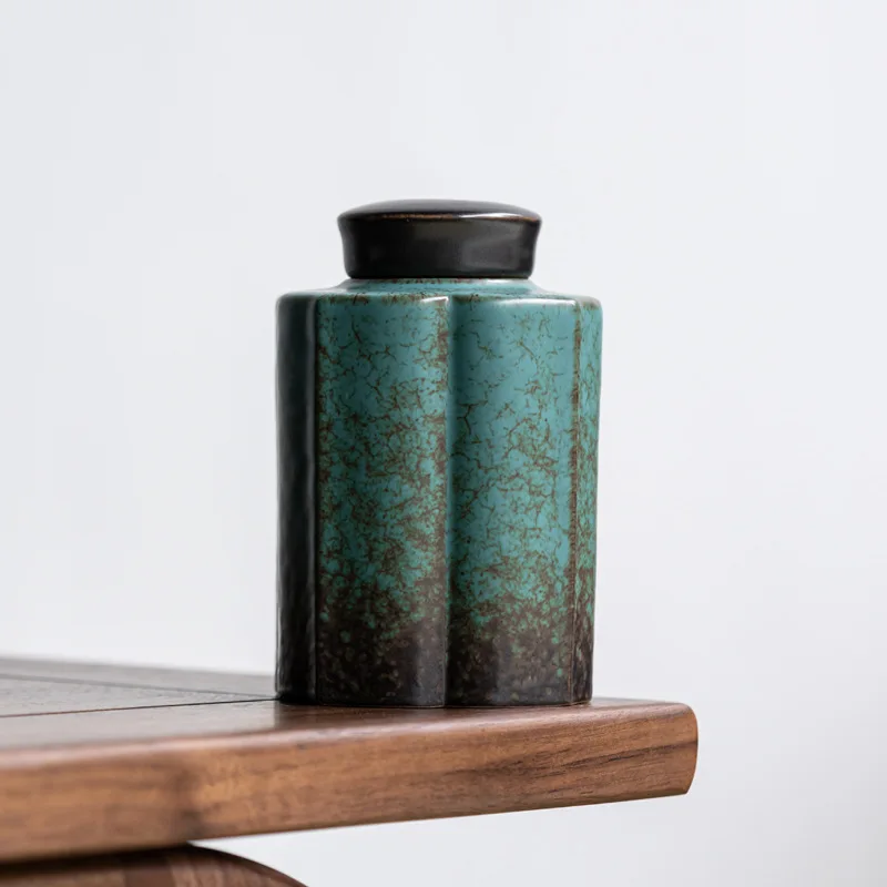 

Керамическая чайная банка с цветком сливы