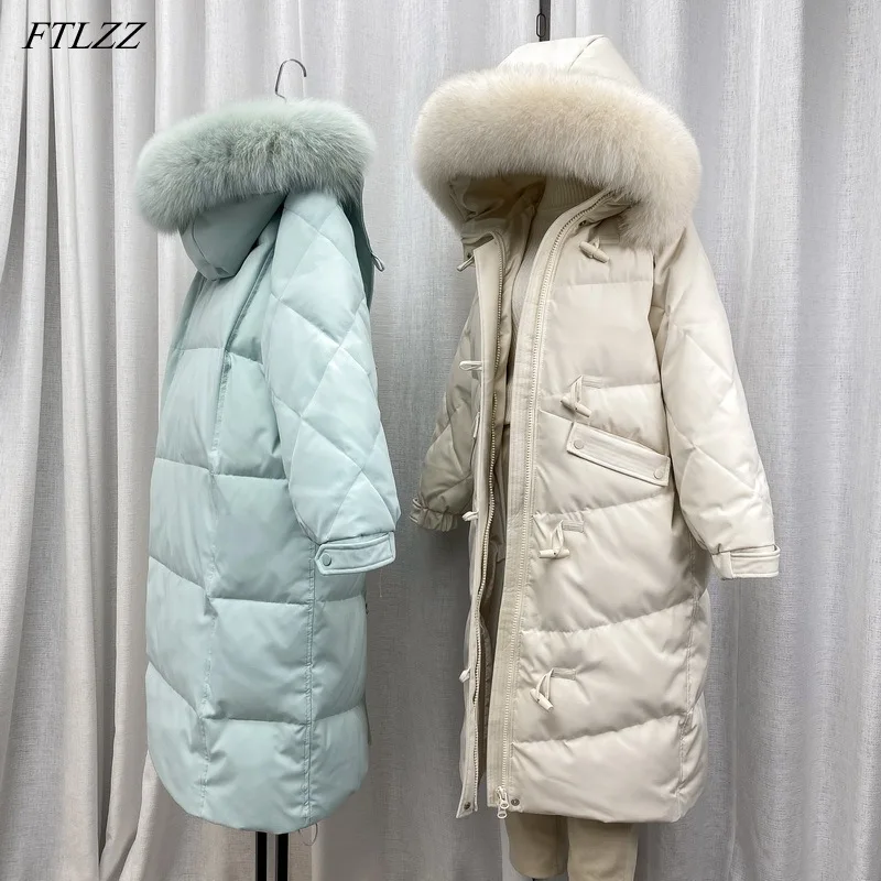 

FTLZZ Winter Large Natural Fur Collar Hooded Down Long Jacket Women Horn Button Snow Warm Outwear 90% White Duck Down Loose Coat