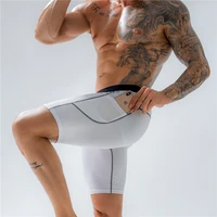 new mens large sports shorts with pockets sweat wicking fast drying training high elastic tight sports pants jogging